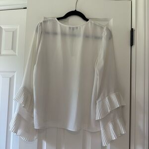 1 state white blouse